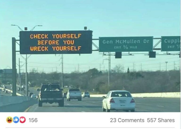 Highway road sign saying" Check yourself before you wreck yourself"